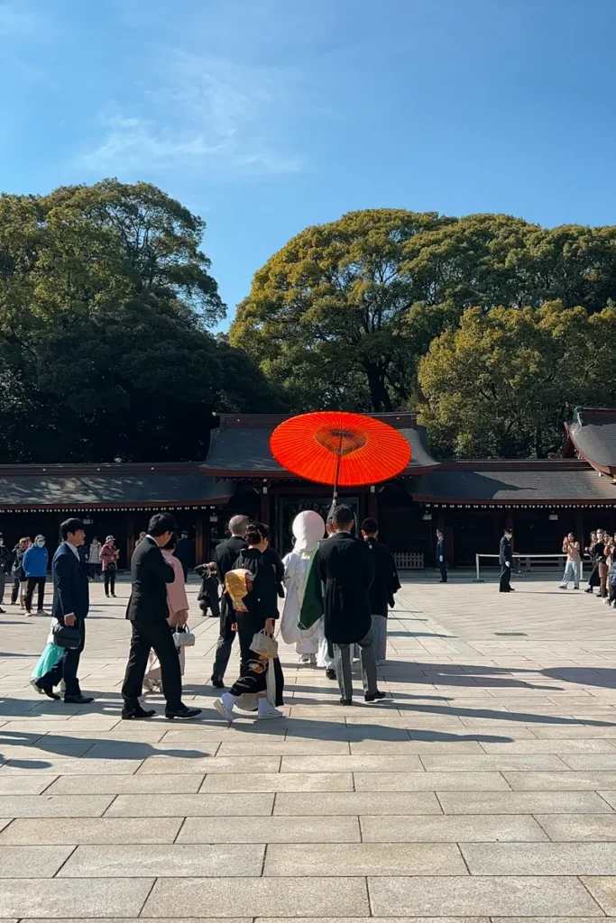 A traditional Shinto wedding procession inside Meiji Jingu shrine.