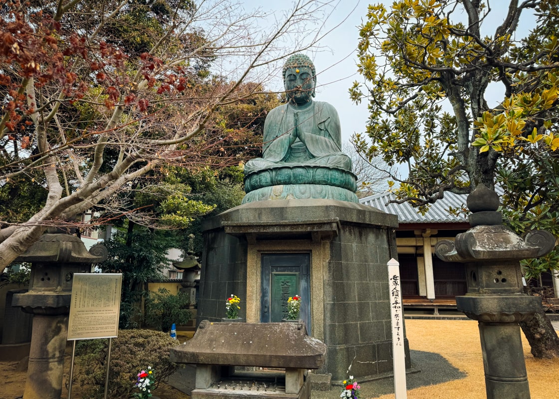 Buddhist statue inside Tennoji Temple near Yanaka Reien, Tokyo.